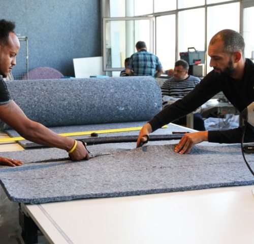 people at work at i-did, a company in The Hague with a social and sustainable mission