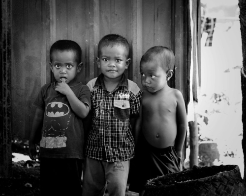 Unsplash Edmund Lou 2-boys-standing-near-wooden-door