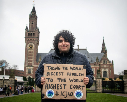 Mert Kumru, Worlds Youth for Climate Justive in front of the Peace Palace