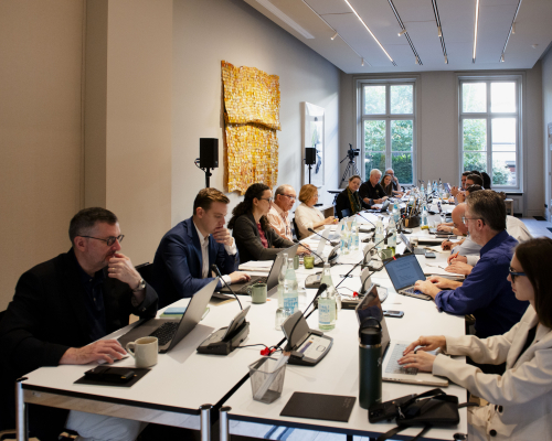 III Europe multiple people around a table.jpg