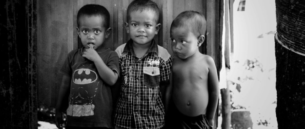 Unsplash Edmund Lou 2-boys-standing-near-wooden-door