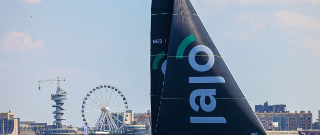 boats racing in the Ocean Race at Sceveningen with the pier in the background