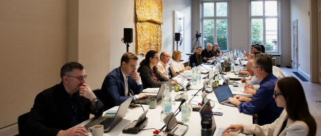 III Europe multiple people around a table.jpg