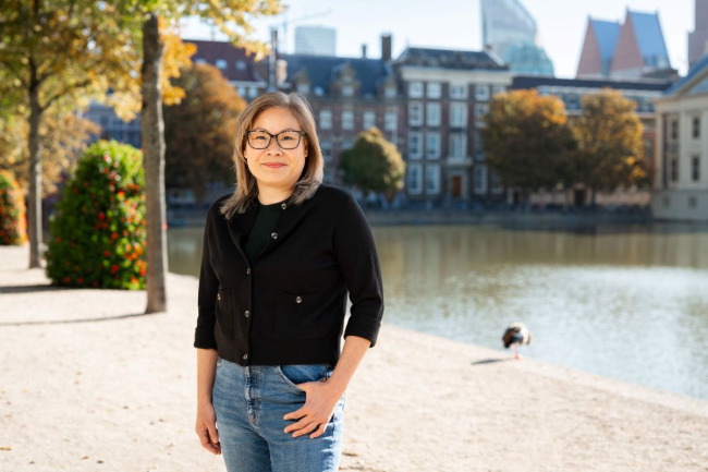 Portrait with the The Hague's Hofvijver in the background